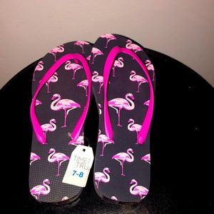 Flamingo pink flip flops